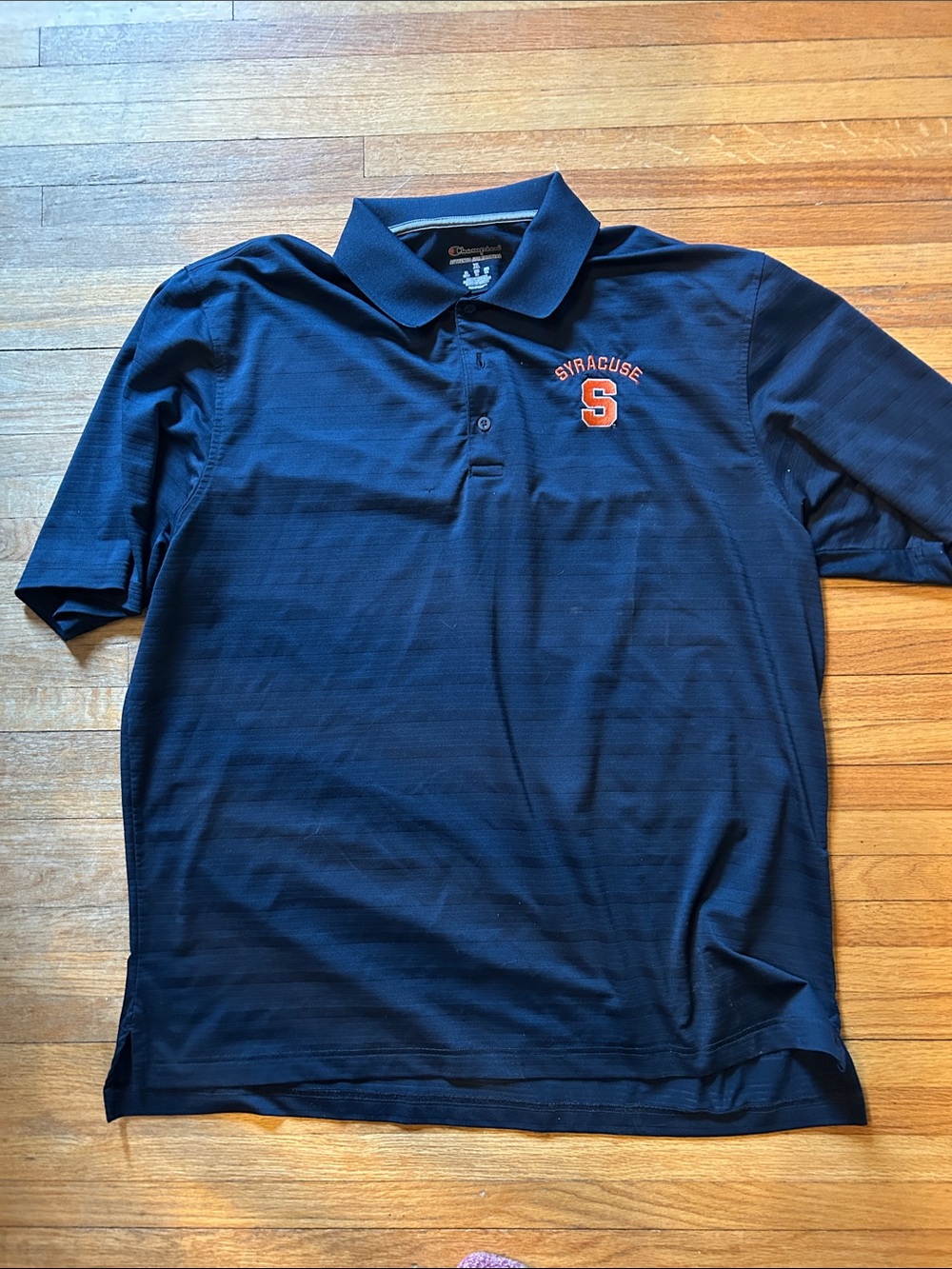 Champion Navy Polo golf shirt with Orange Syracuse Block S Patch. Men’s size xl